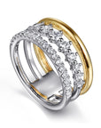 Two diamond-studded rings, one gold and one silver, on a white background- angled