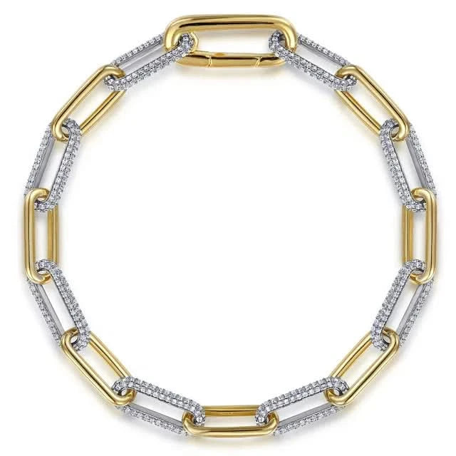 Gold and white gold diamond chain bracelet on a white background