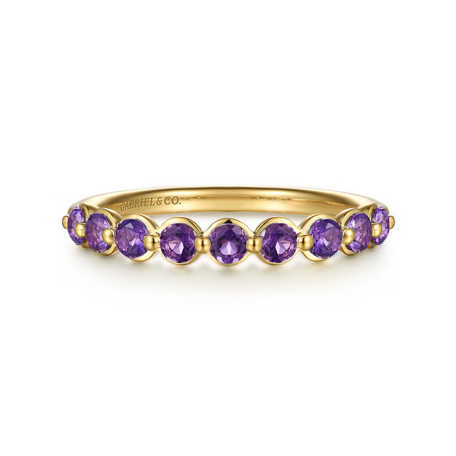 A yellow gold  ring featuring nine round-cut purple amethyst gemstones, shown on a clean white background. The brand name 'GABRIEL &amp; CO.