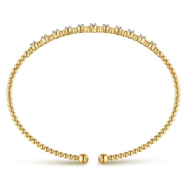 yellow gold bujukan beaded bracelet with diamond stations- side view