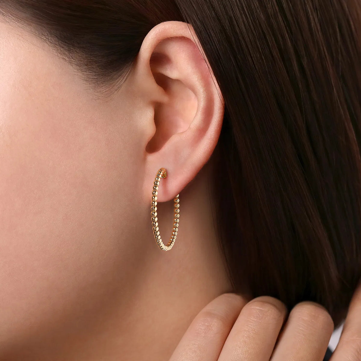 Gabriel &amp; Co. Yellow Gold 30mm Bujukan Classic Hoop Earrings- Modeled - Skeie's Jewelers