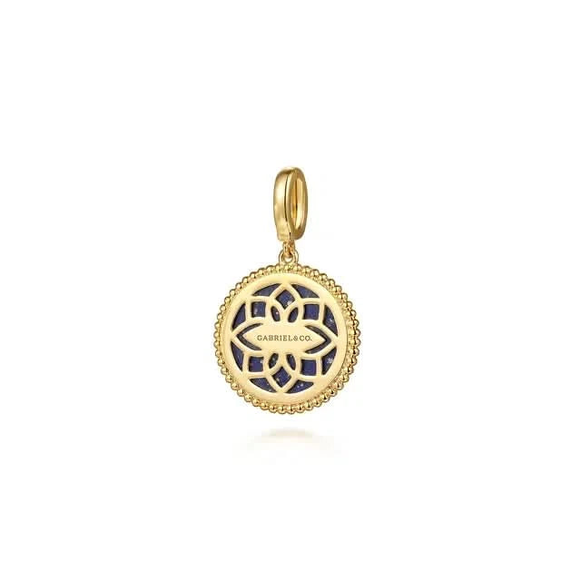 Gold pendant with blue design on a white background