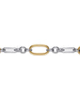 A close-up of a two-tone chain link necklace featuring alternating polished gold and silver links, set against a solid white background.