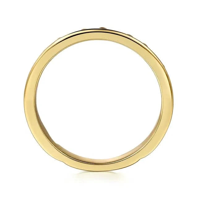 Gold ring on a white background