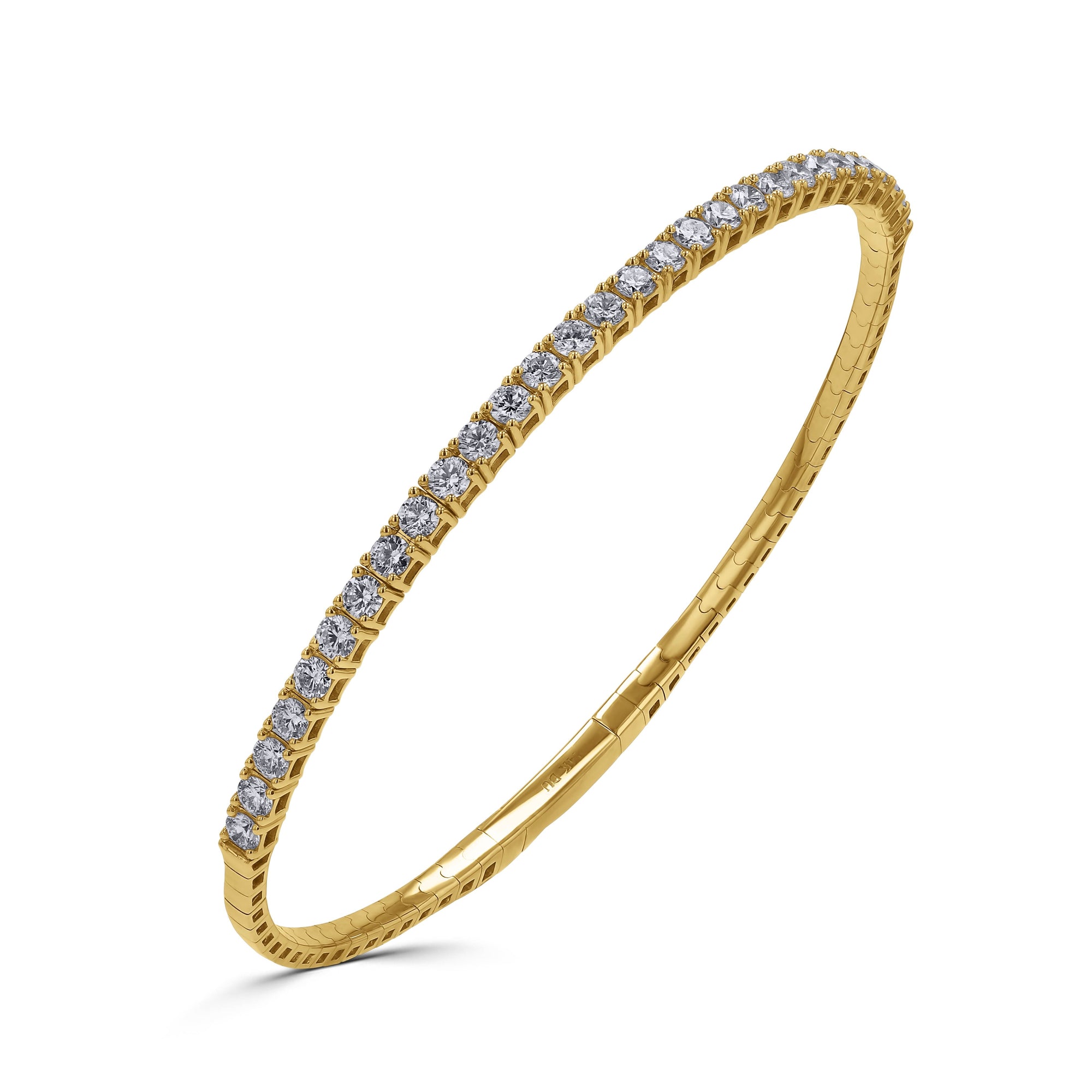 A bold 14k yellow gold rigid oval bangle bracelet from the 1.90 carat variant option, showcasing a single row of substantial, large round brilliant diamonds across the top half. angled view