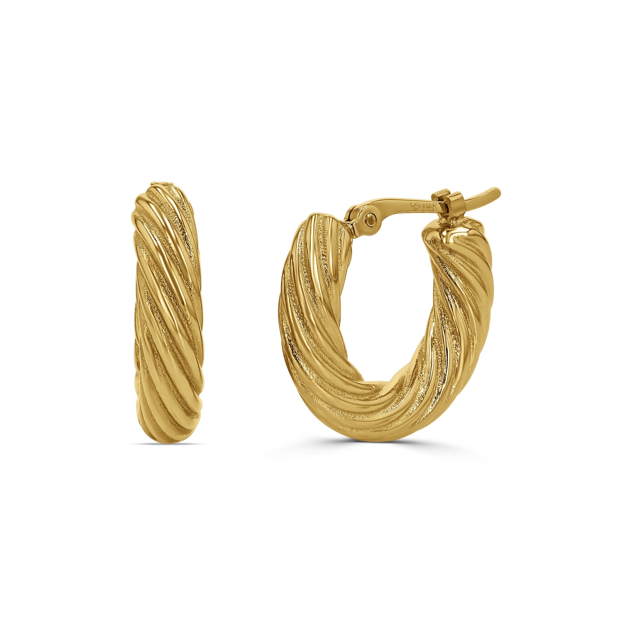 Gold textured hoop earrings on a white background