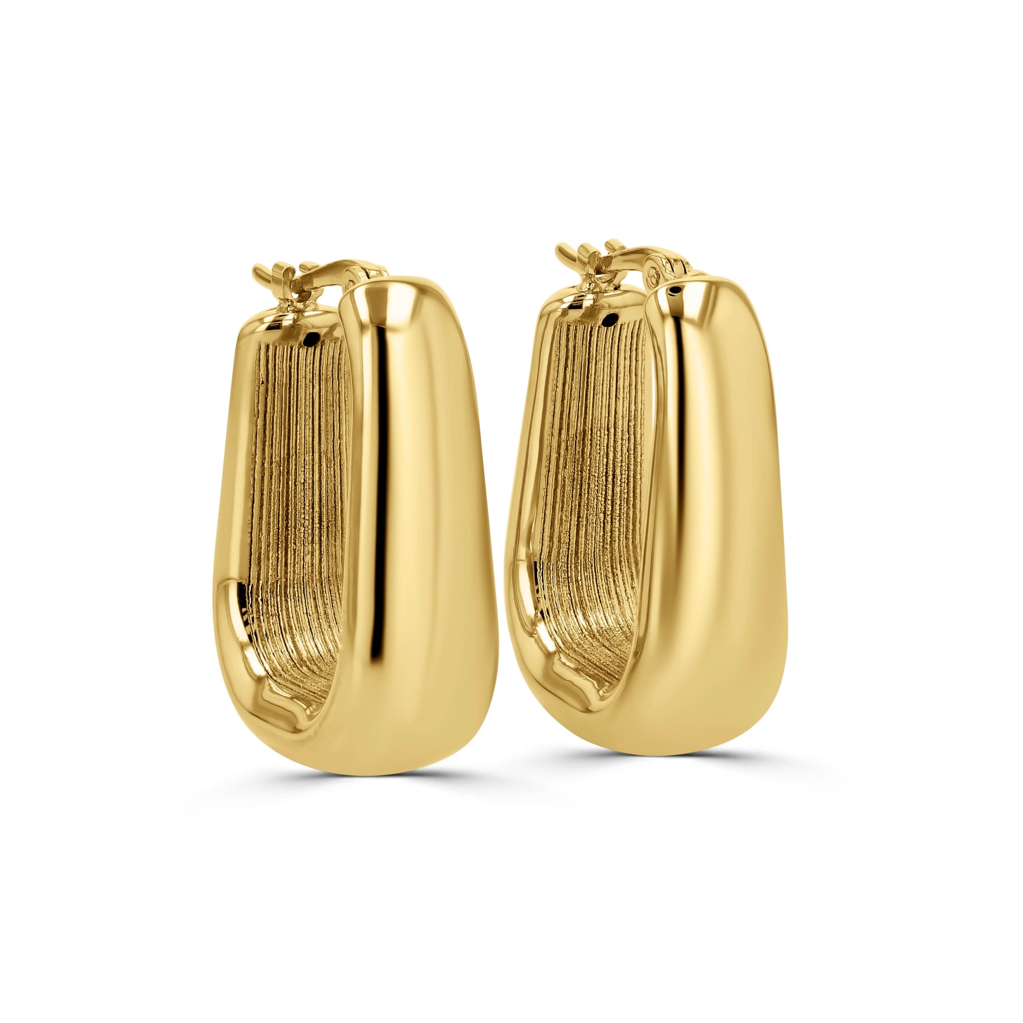 Pair of gold hoop earrings on a white background