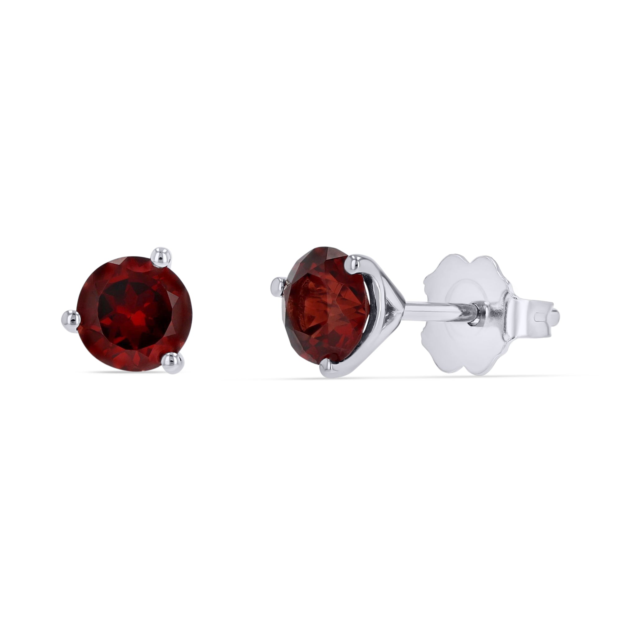 A pair of genuine round deep-red garnet stud earrings set in 14k white gold 3-prong mountings, showcasing one front view and one side profile view with a friction back on a solid white background.