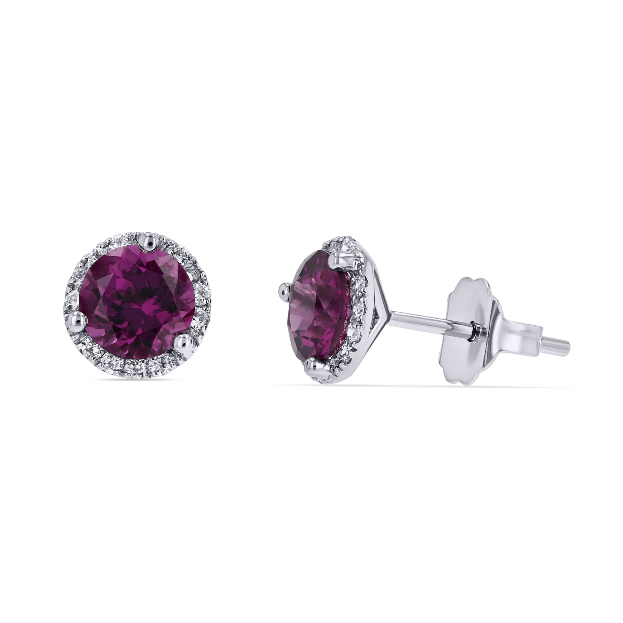 A pair of genuine 6mm round rhodolite garnet halo stud earrings featuring vibrant purplish-red center stones bordered by brilliant white diamonds in a 14k white gold setting. The image displays one front-facing earring and one angled side profile view showing the friction post and scalloped backing on a solid white background.
