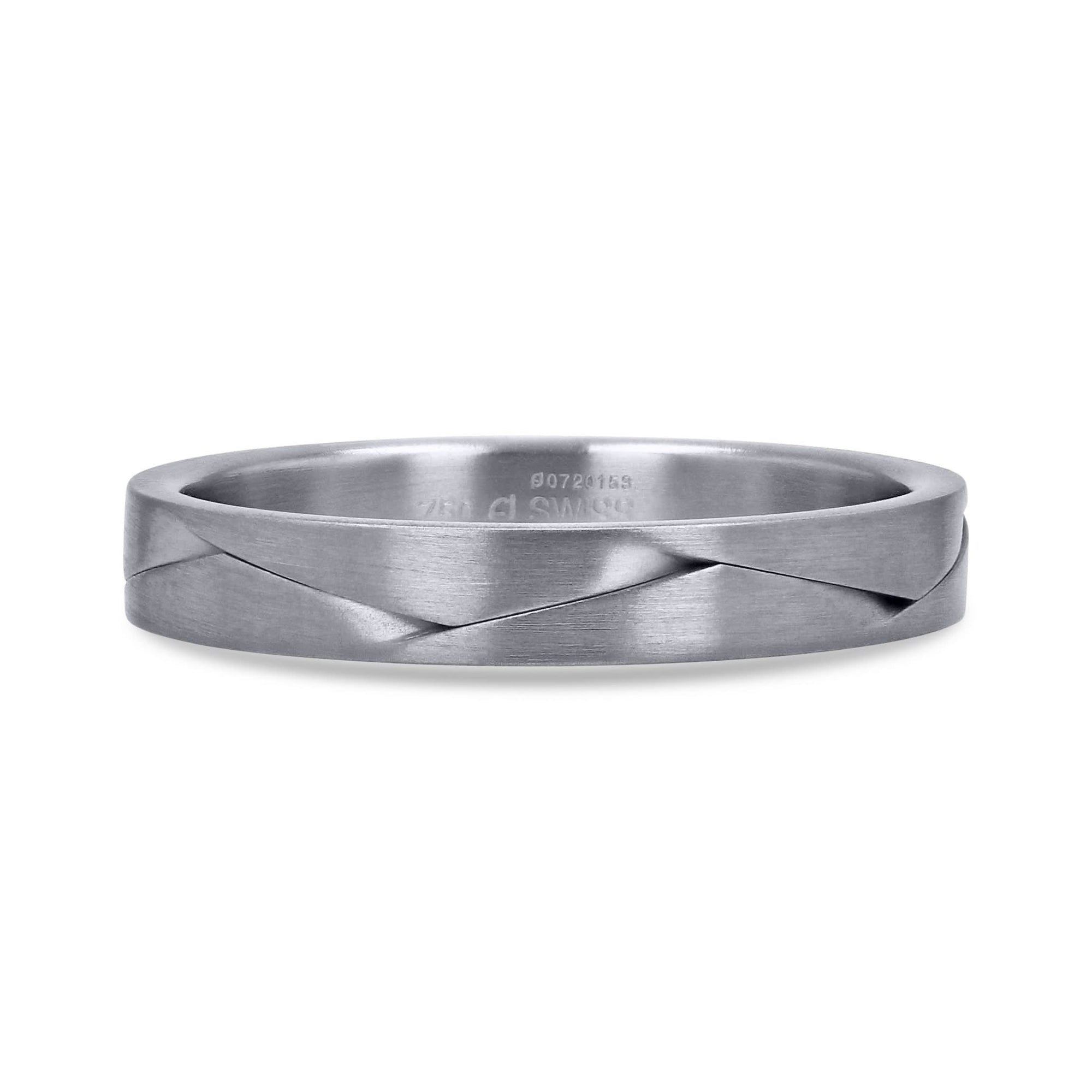 A 3.5mm wedding band by Furrer Jacot, crafted in solid 18k white gold with an architectural, sculpted overlapping braid pattern finished in a fine matte brushed texture.
