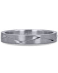 A 3.5mm wedding band by Furrer Jacot, crafted in solid 18k white gold with an architectural, sculpted overlapping braid pattern finished in a fine matte brushed texture.