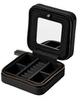 A black zippered jewelry organizer case shown open, featuring a mirror on the inside of the lid, divided compartments, and ring slots, photographed on a white background.