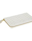 An off-white quilted zip-around case with a gold zipper and a matching tassel zipper pull, shown on a plain white background.