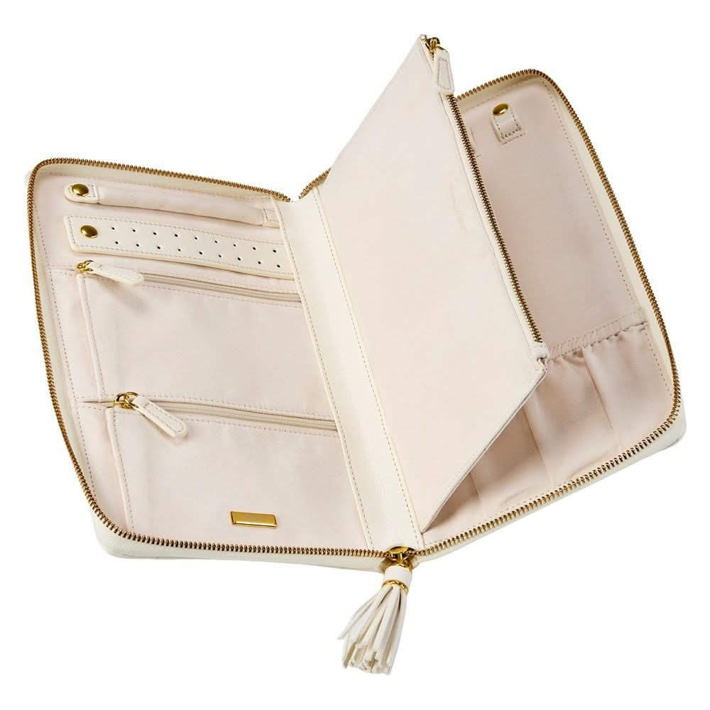 An open cream-colored zip-around case with gold-tone zippers, interior card slots, and a tassel zipper pull, shown on a plain white background.