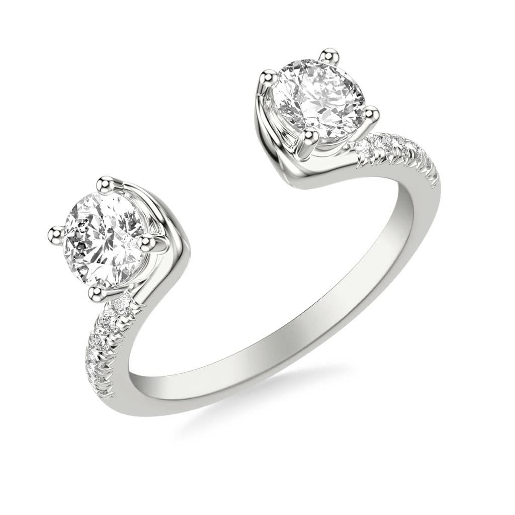 Angled view of ring enhancer with two prominent round stones and diamond lined shoulders.