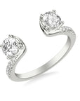Angled view of ring enhancer with two prominent round stones and diamond lined shoulders.