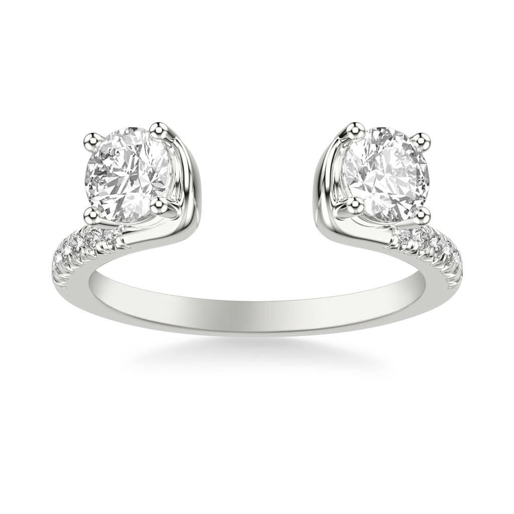 A Frederick Goldman diamond ring enhancer crafted in 14k white gold, featuring an open-gap bypass shank design showcasing two four-prong set round brilliant diamonds framing the opening with diamond accents along the polished shoulders.