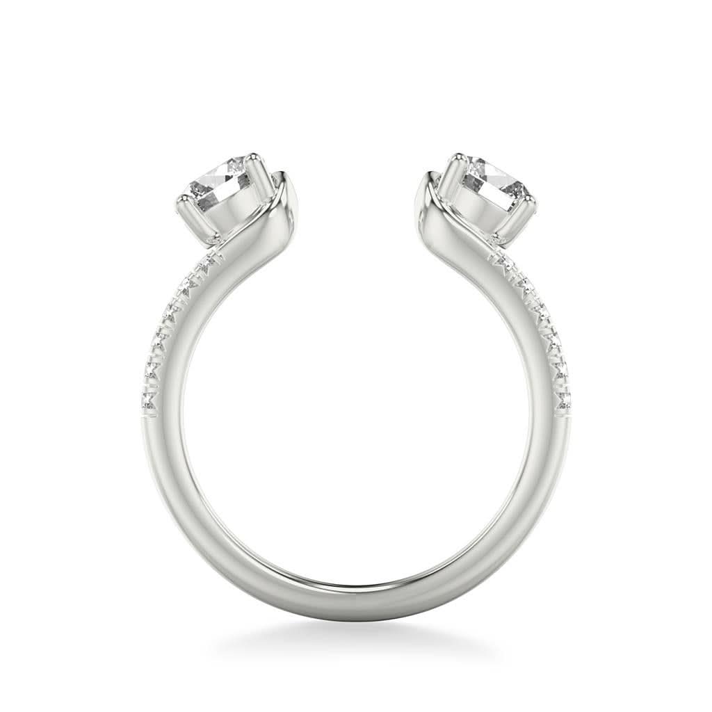 White Gold ring with two prominent gemstones on a white background