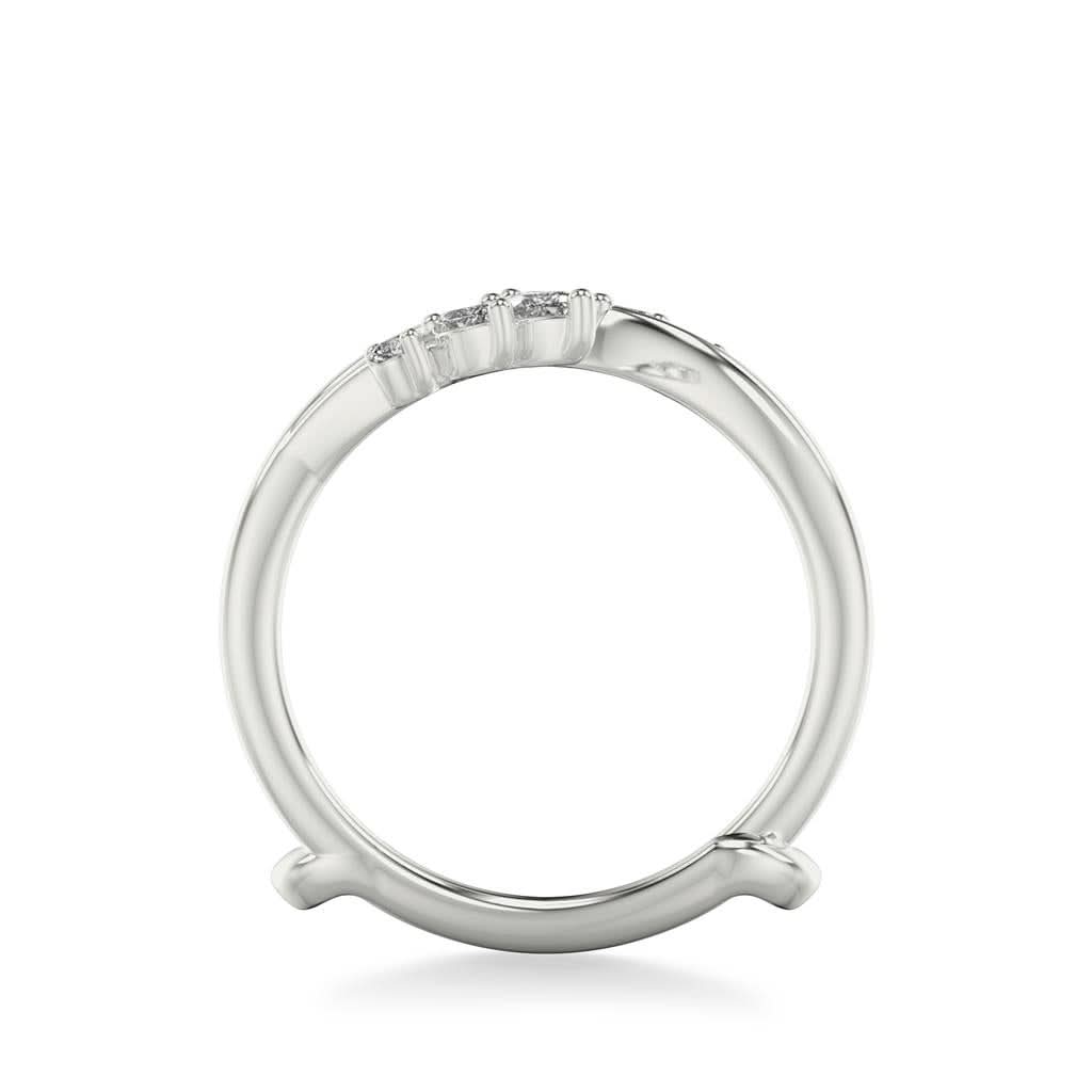 white gold  ring with diamonds on a white background side view