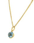 Blue Topaz East-West Round Pendant - Skeie's Jewelers