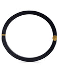 Black bracelet with gold accents on a white background side view