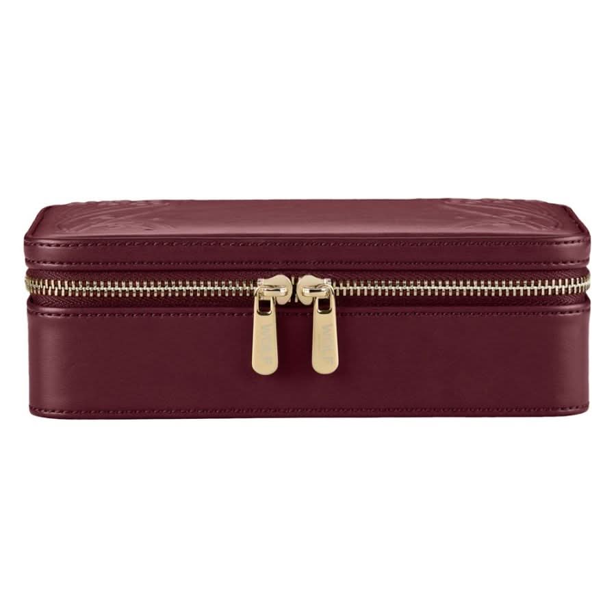 Maroon jewelry box with gold zipper on a white background