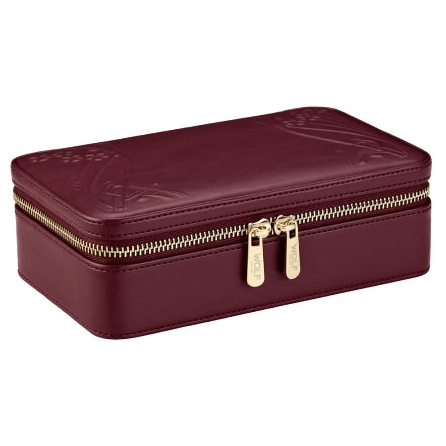 Maroon jewelry box with gold zipper on a white background