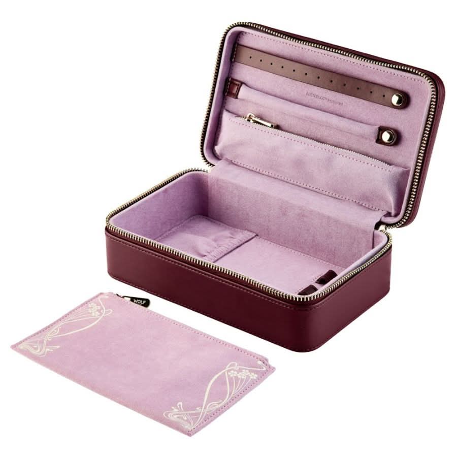Pink jewelry case with a matching pouch on a white background