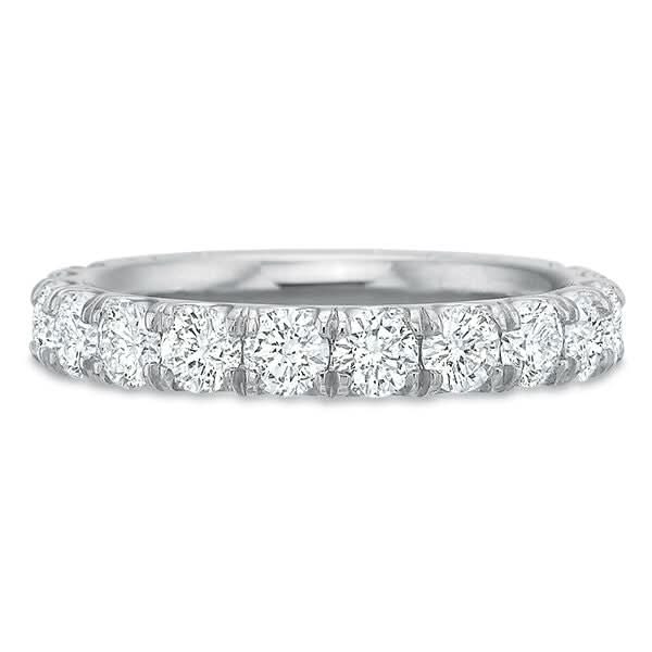 A silver diamond  ring with a continuous row of round-cut diamonds set in a polished silver band, shown against a plain white background.