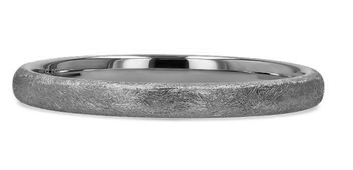 WHITE GOLD BAND WITH A SCRATCHY TEXTURE ON A WHITE BACKGROUND