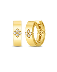 Gold hoop earrings with floral designs and clear stones on a white background