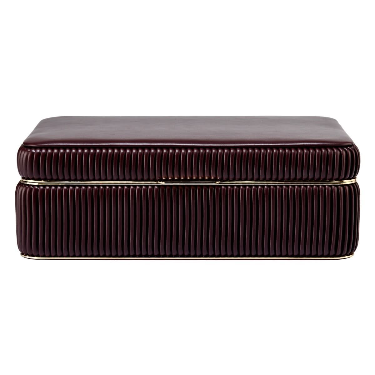 front view of maroon closed  ribbed jewelry box with gold clasp on a white background