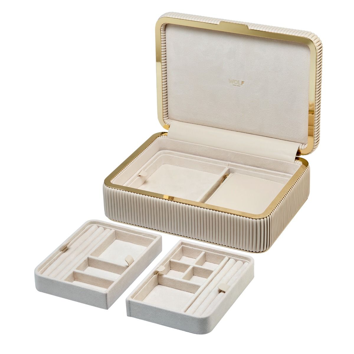 Beige jewelry box with gold accents opened with compartments removed on a white background