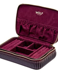 Open burgundy jewelry case with compartments and 'WOLF' branding on a white background