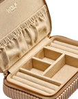 Beige jewelry case with compartments and 'WOLF' branding on a white background