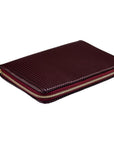 Maroon case with gold zipper on a white background