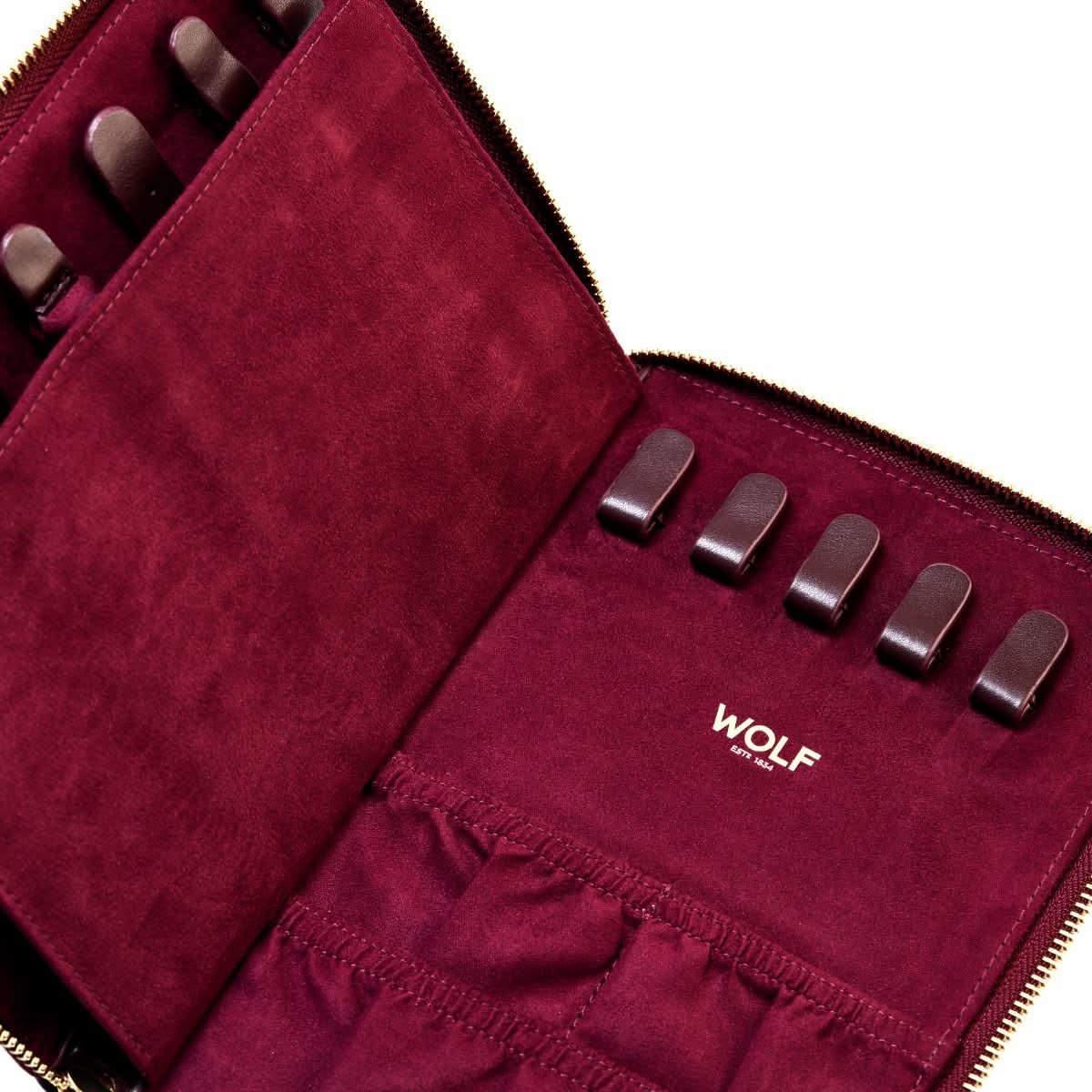Maroon jewelry case with 'WOLF' branding on a white background