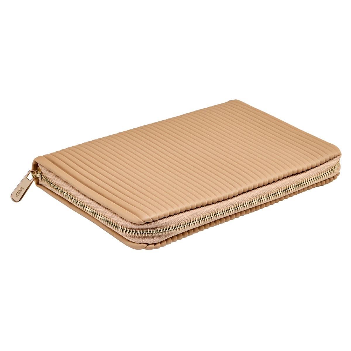 Beige ribbed zippered pouch on a white background