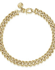 Gold curb link chain bracelet on a white background