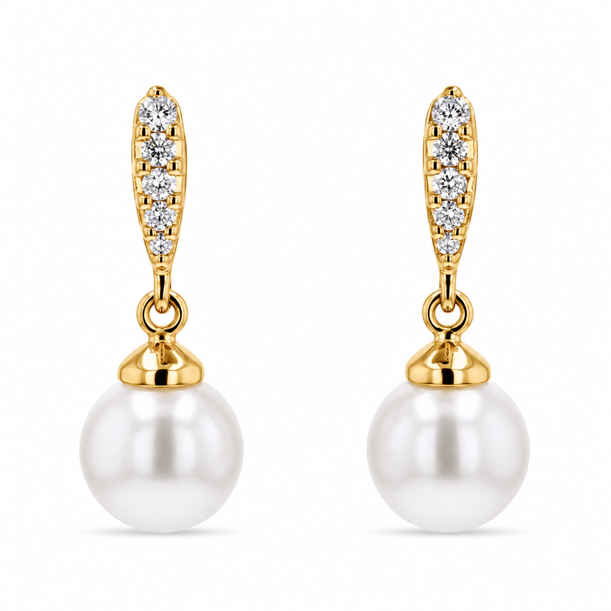 A pair of gold drop earrings featuring a row of clear pavé-set round diamonds on the top bar and a large, lustrous white pearl dangling below, set against a plain white background.