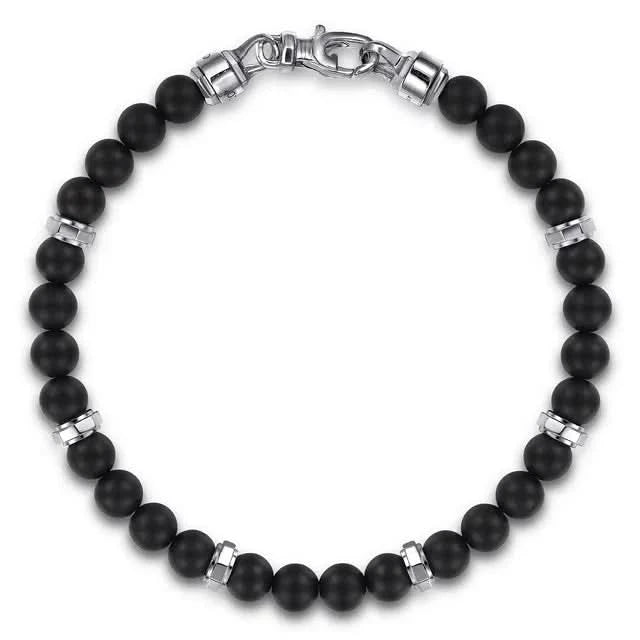 Black beaded bracelet with silver accents on a white background