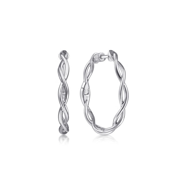 Pair of twisted silver hoop earrings on a white background