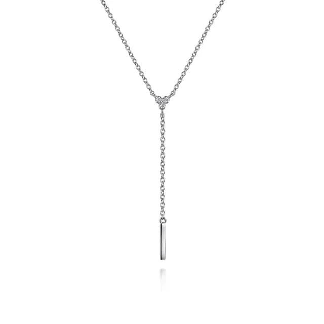 Silver necklace with a bar pendant on a white background