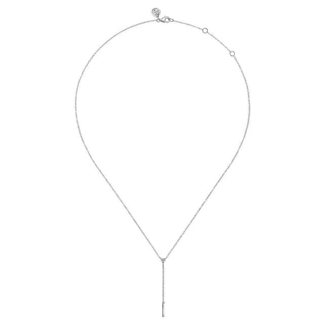 Silver necklace with a delicate chain on a white background