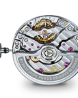 Close-up of a Grand Seiko watch mechanism on a white background