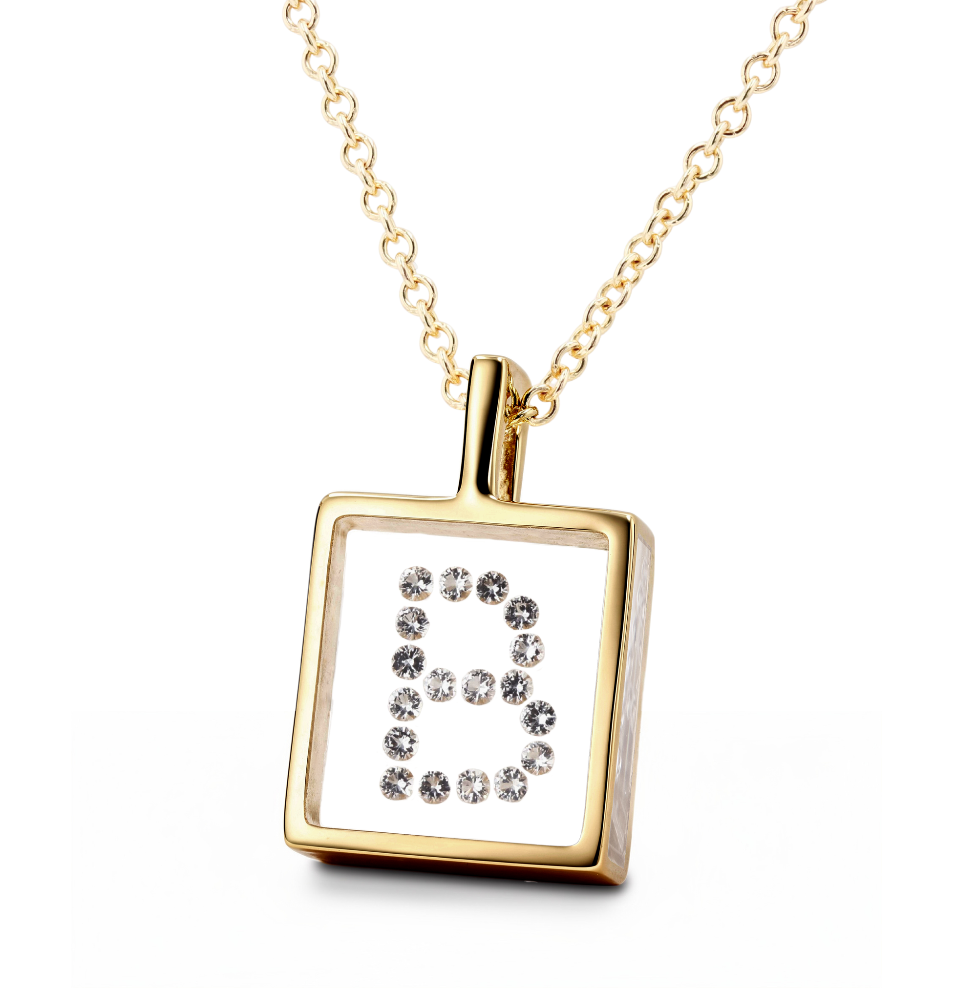A gold pendant necklace featuring a square frame with a clear center panel set with small diamonds arranged to spell the letter 'B'.