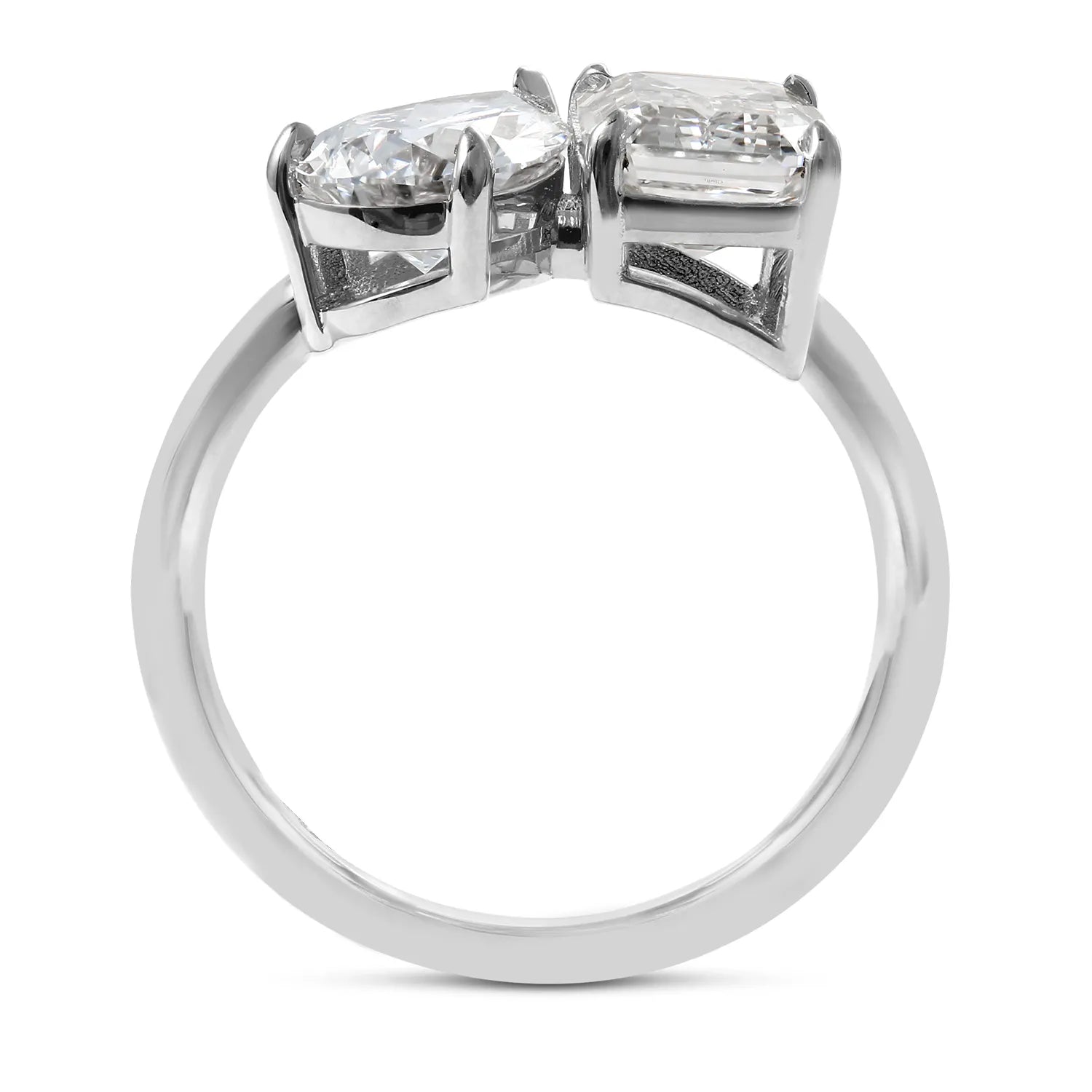 lab Diamond ring with two prominent gemstones on a white background