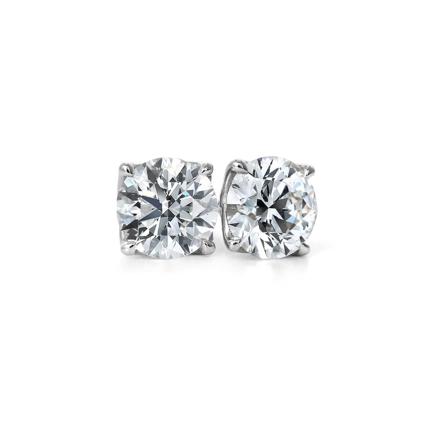 Pair of earrings with lab diamonds on a white background