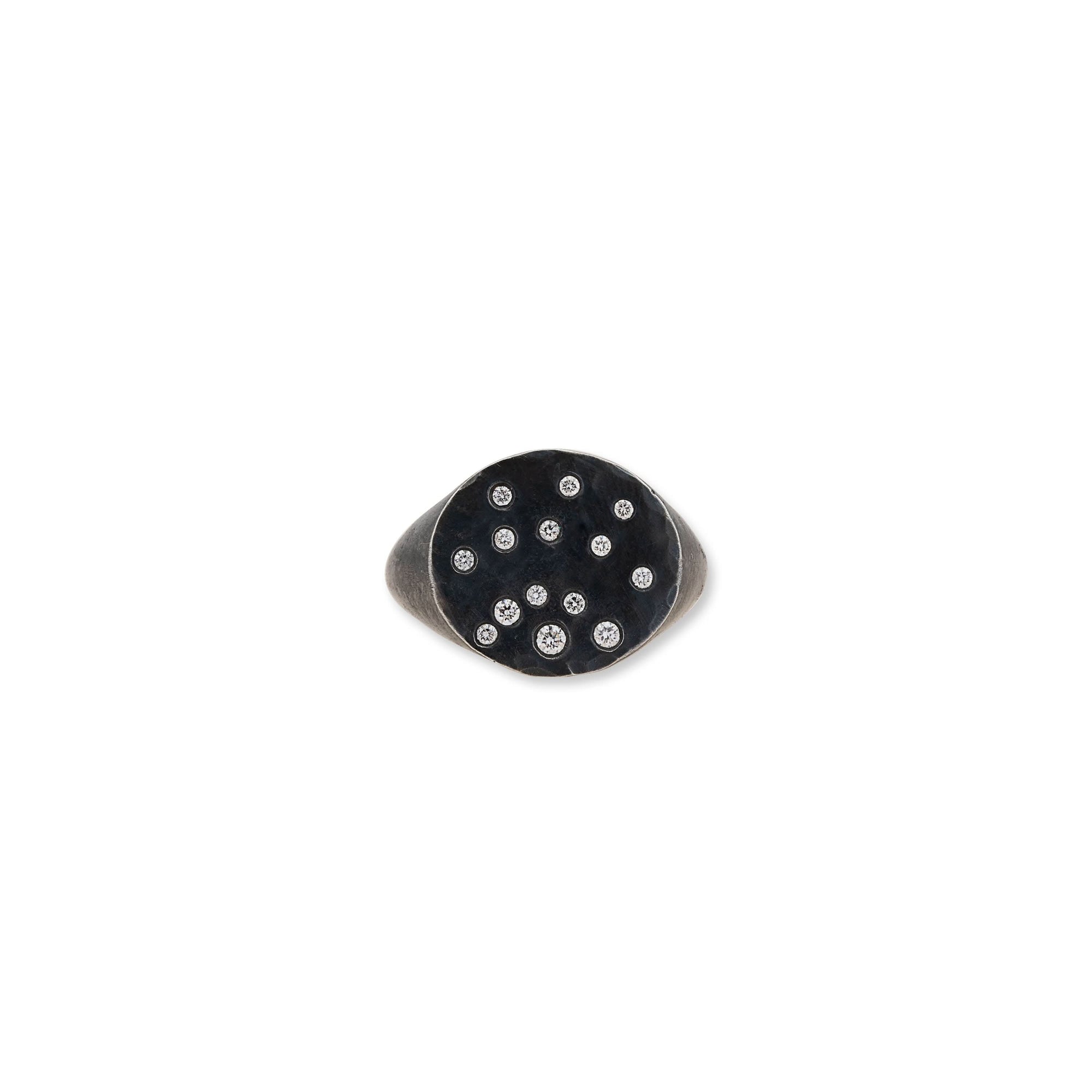 Black ring with embedded diamonds on a white background