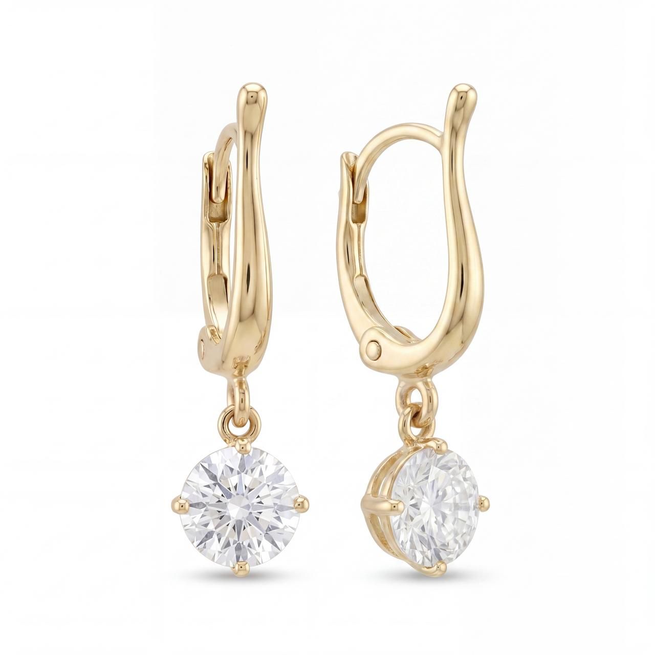 Gold earrings with diamonds on a white background